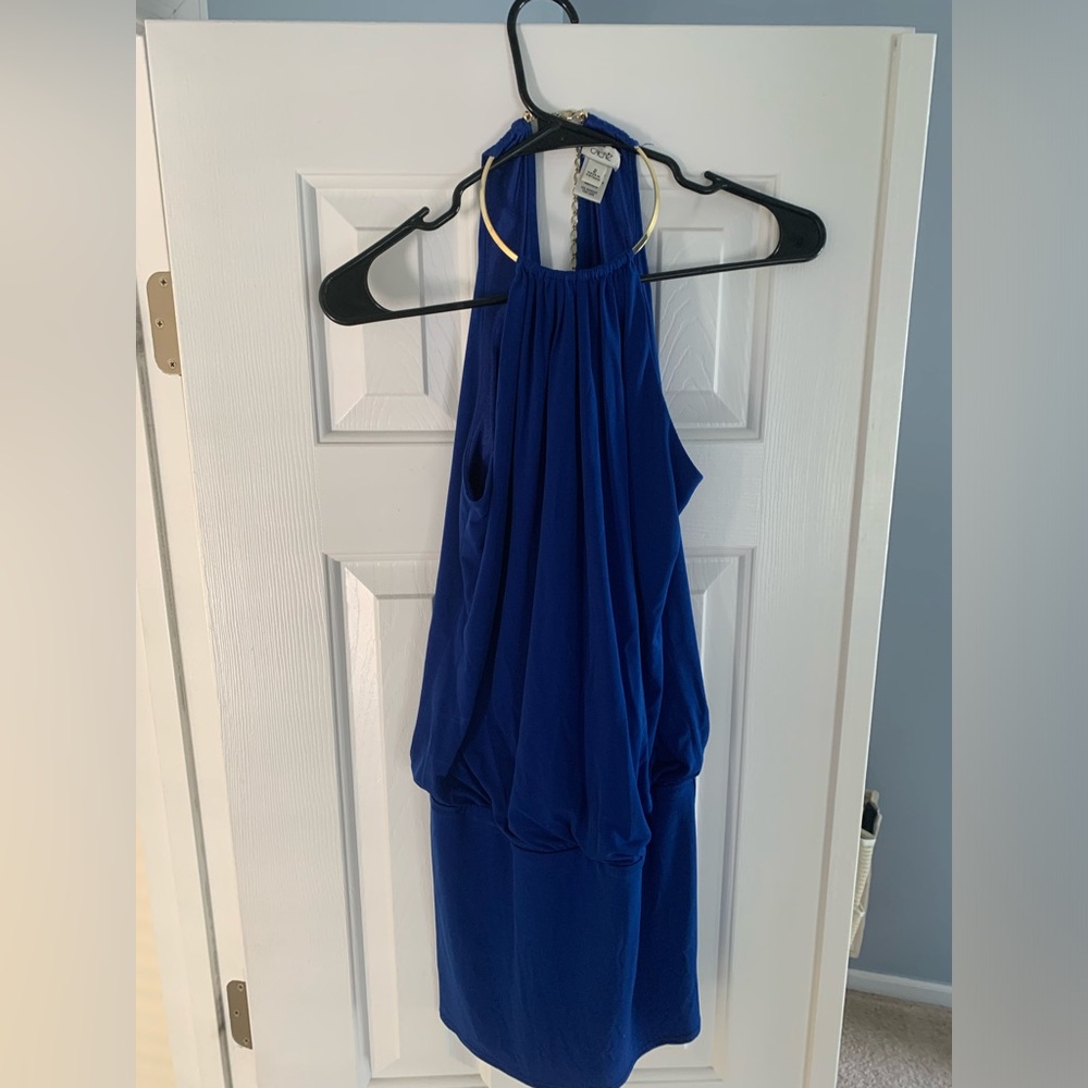 Cocktail dress with cold chocker collar. Keyhole back detail